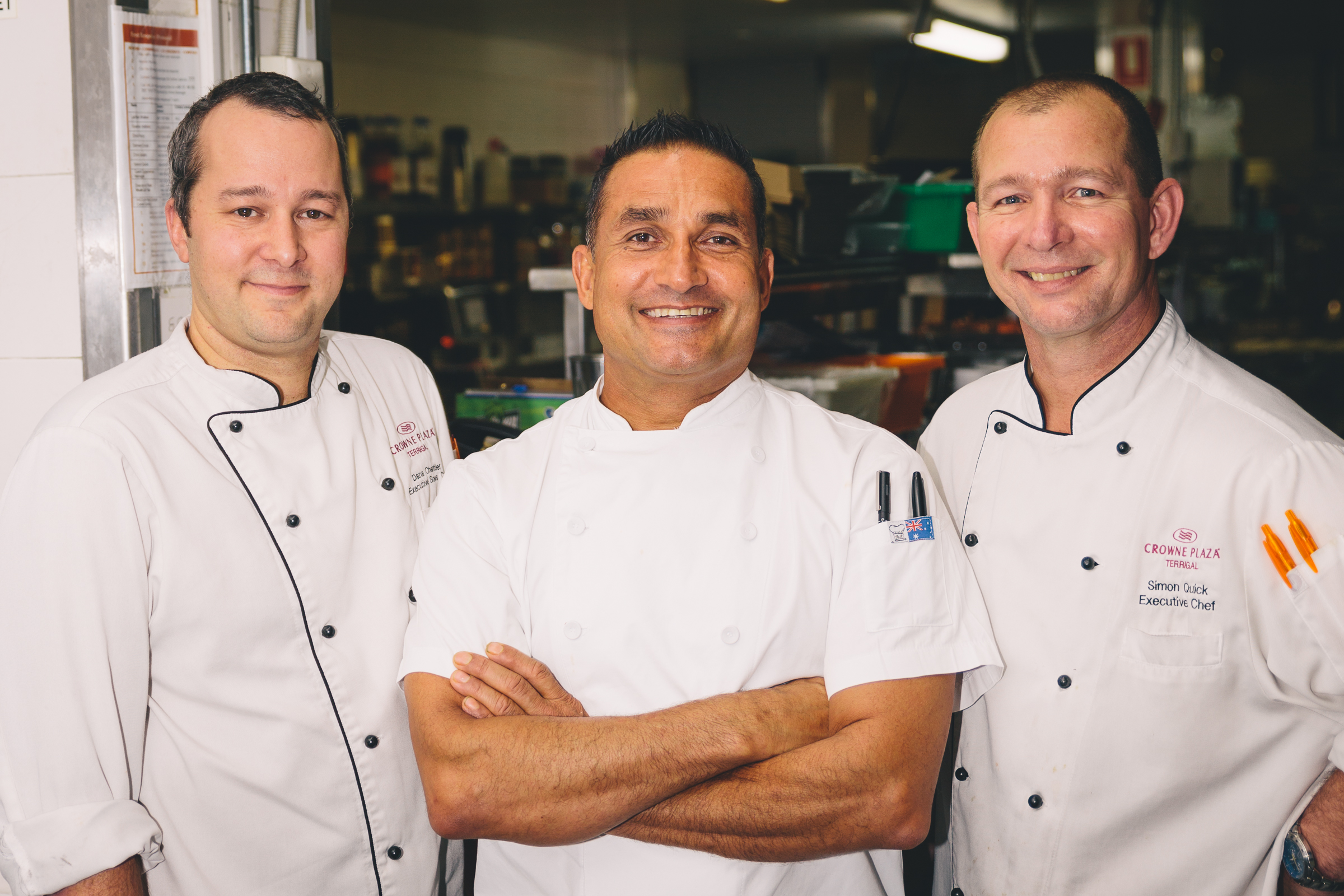 Peter Kuruvita joins Dana and Simon Quick in the Crowne Plaza Terrigal kitchen. Photo: Jac Powell