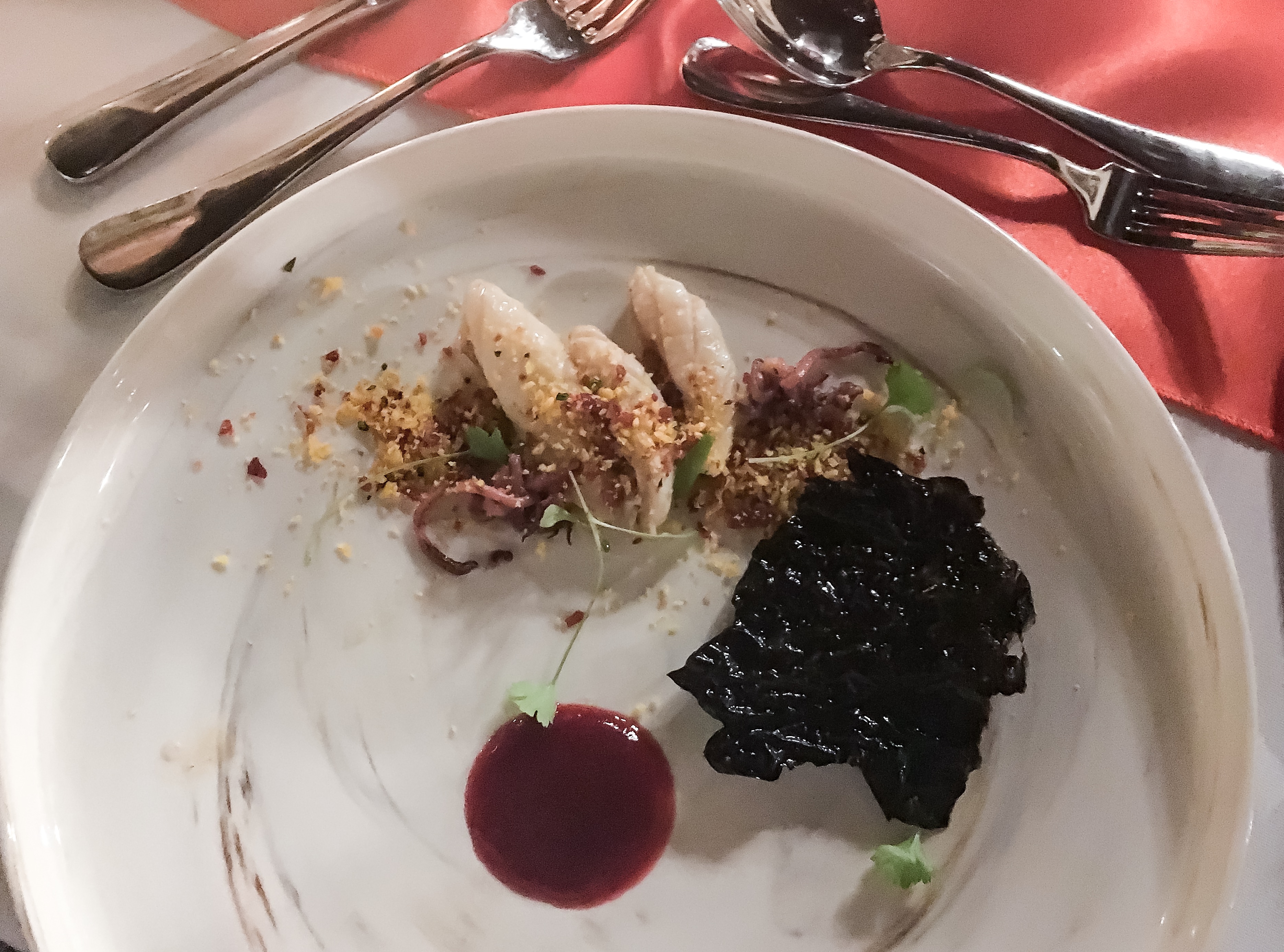 BBQ calamari and squid ink crackle at Peter Kuruvita's seafood feast at Crowne Plaza Terrigal